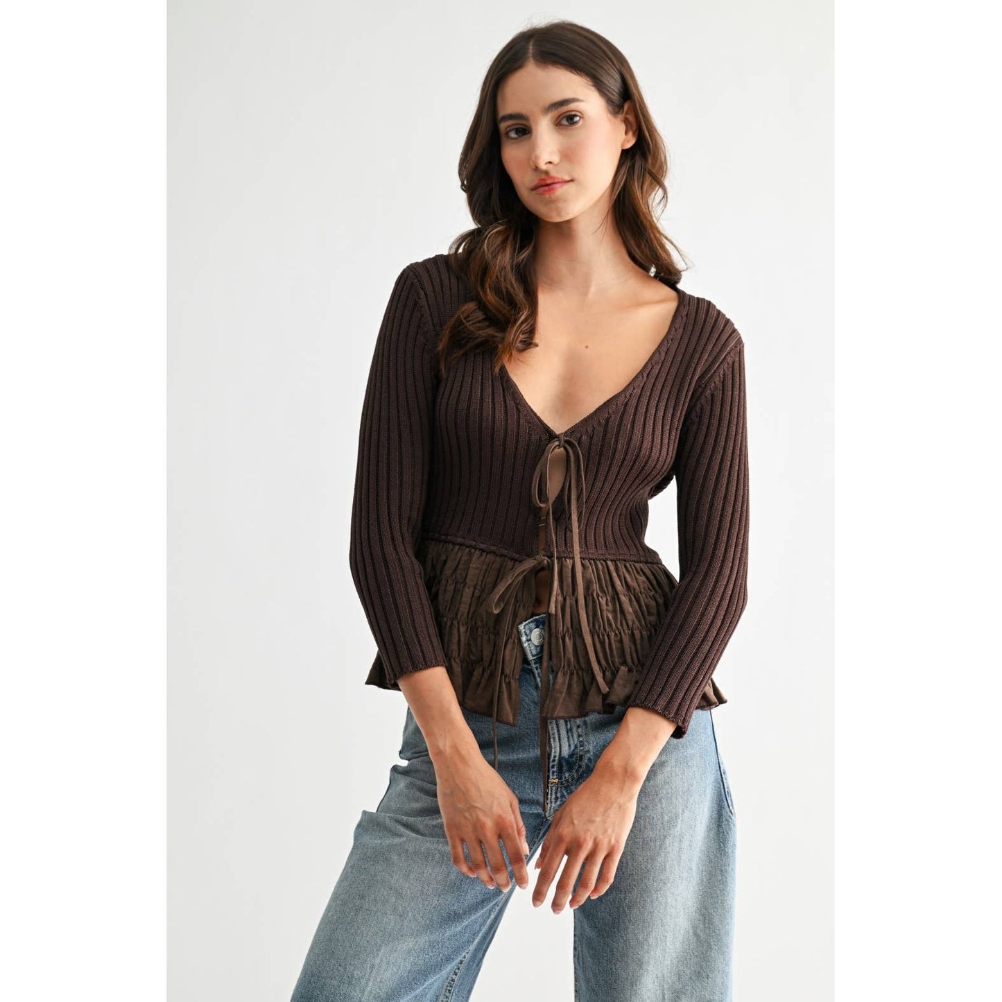 TEXTURED KNIT BLOUSE WITH RUCHED PEPLUM