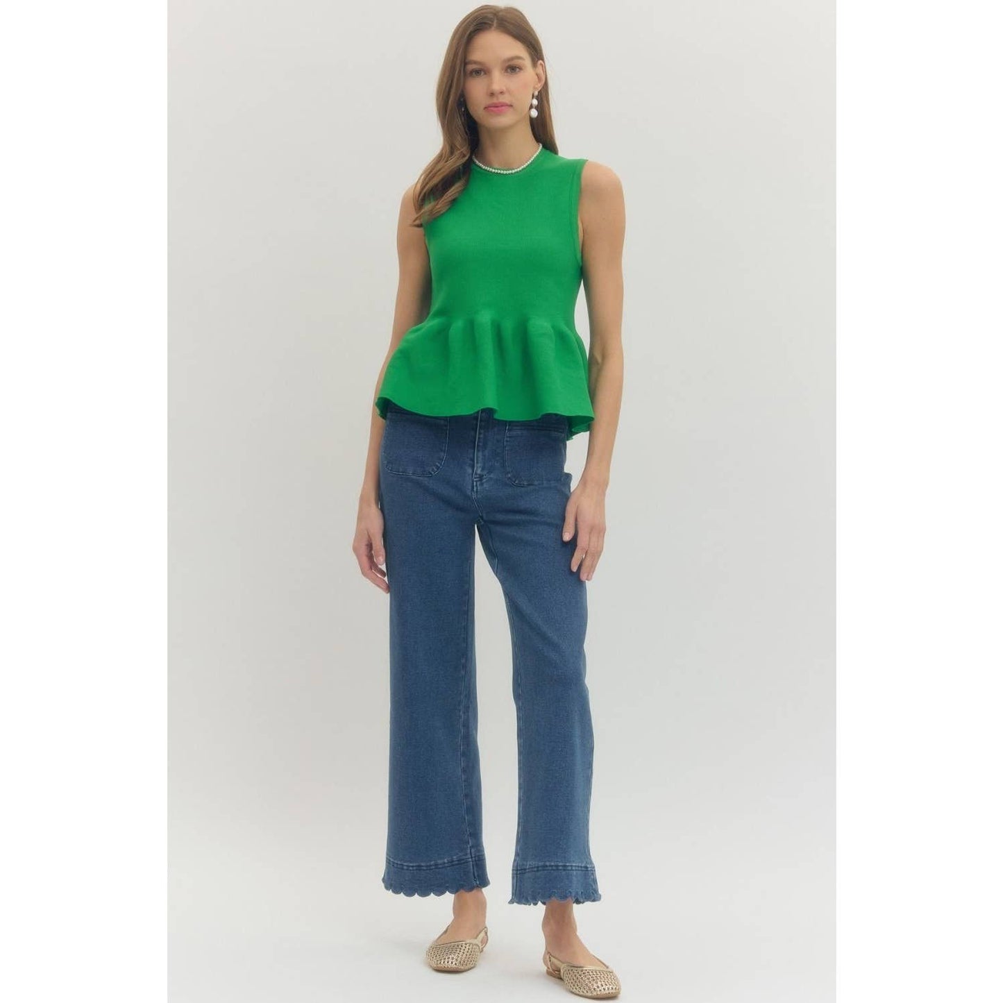 Solid sleeveless peplum top