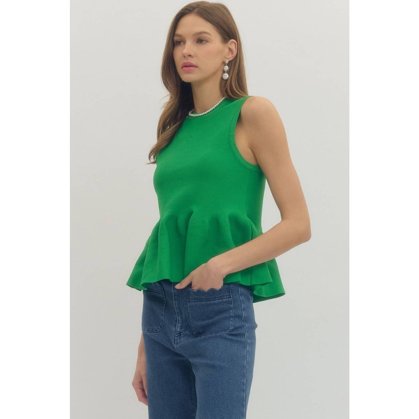 Solid sleeveless peplum top
