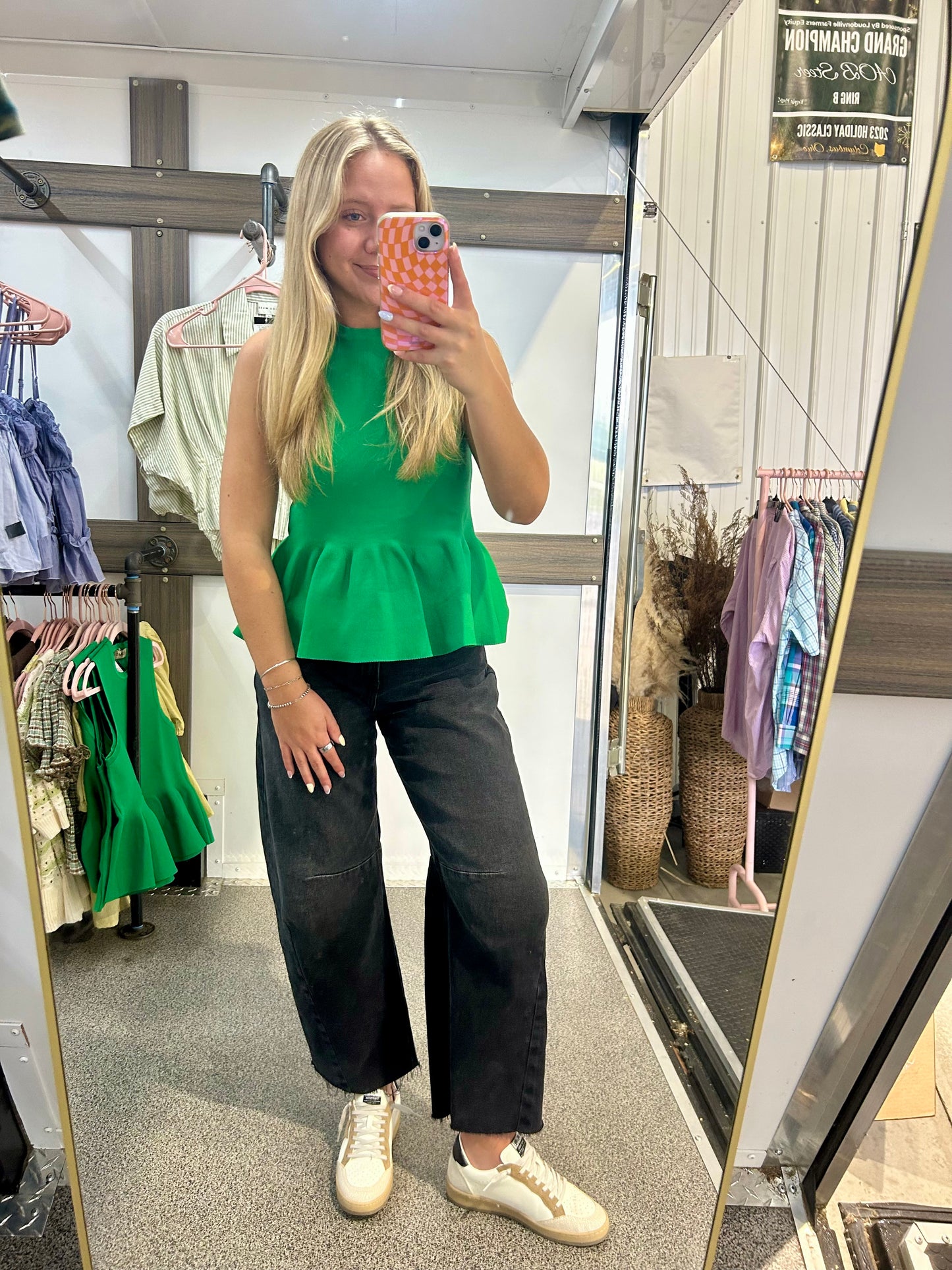 Solid sleeveless peplum top