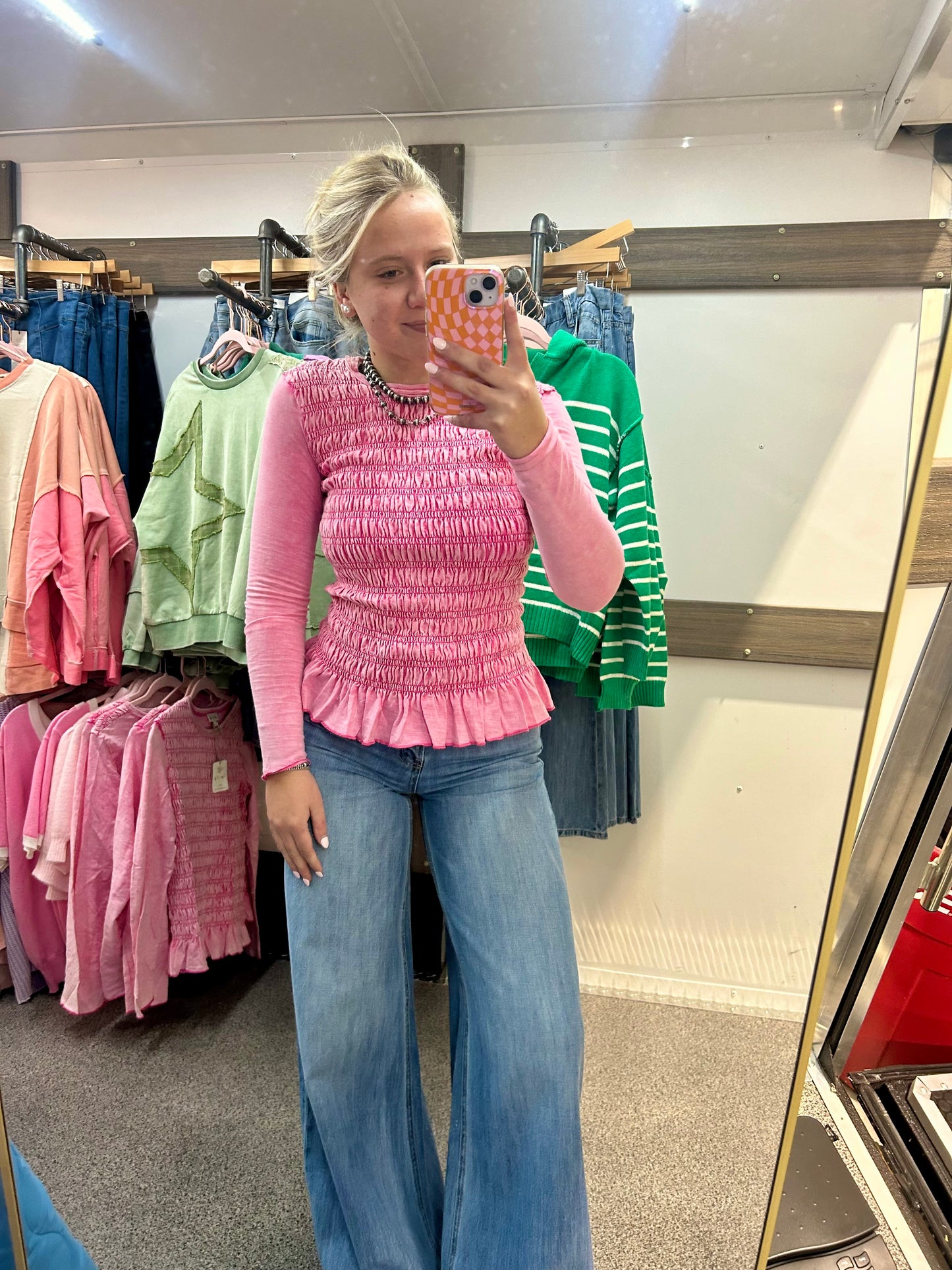 Smocked Peplum Long Sleeve Top