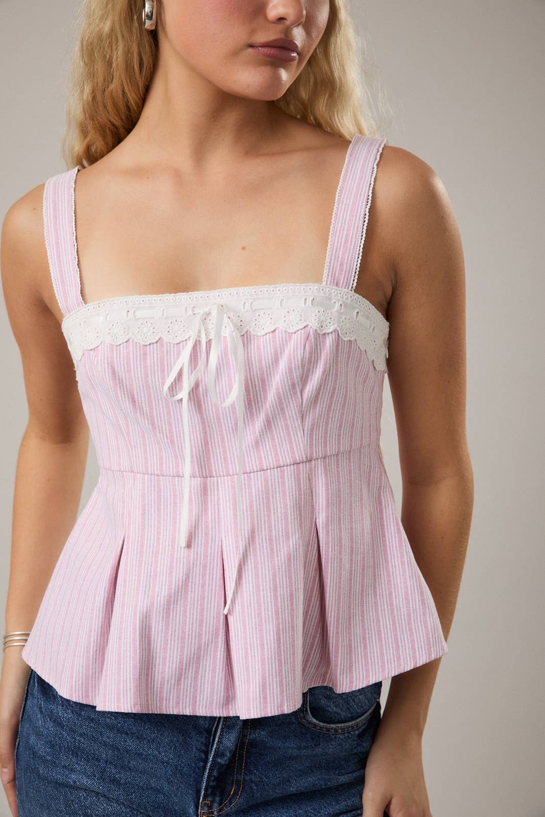 SLEEVELESS TOP WITH RIBBON BOW DETAIL ON FRONT